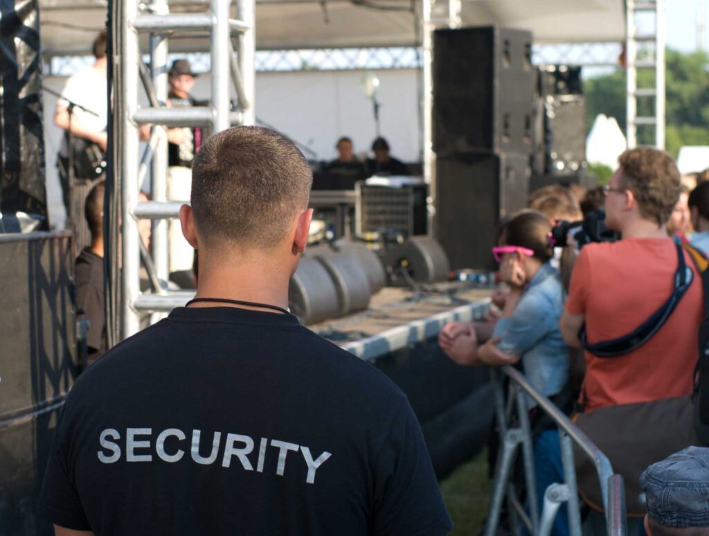 security guard looking over the crowds