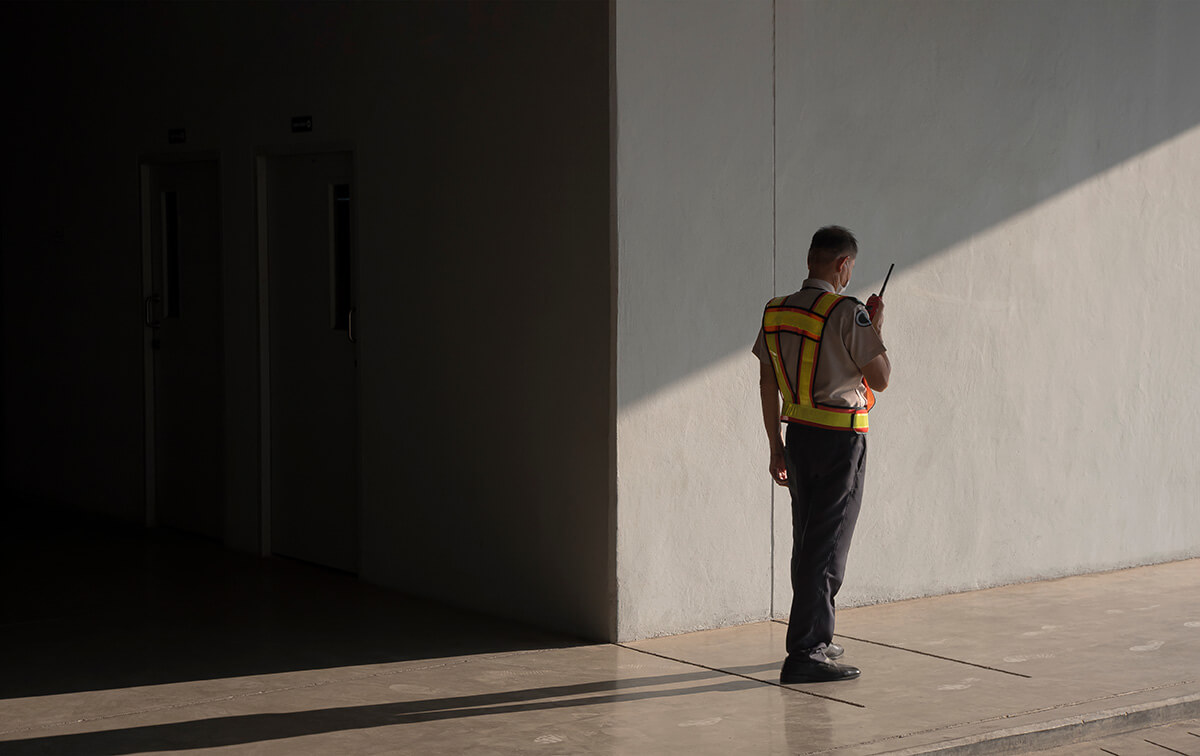 Asian security guard in safety vest Asian security guard in safety vest